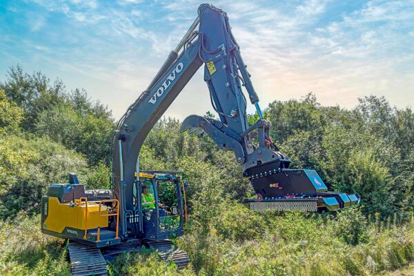 Volvo attachment for clearing land